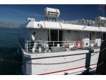 Starboard quarter view showing deck and superstructure detail.